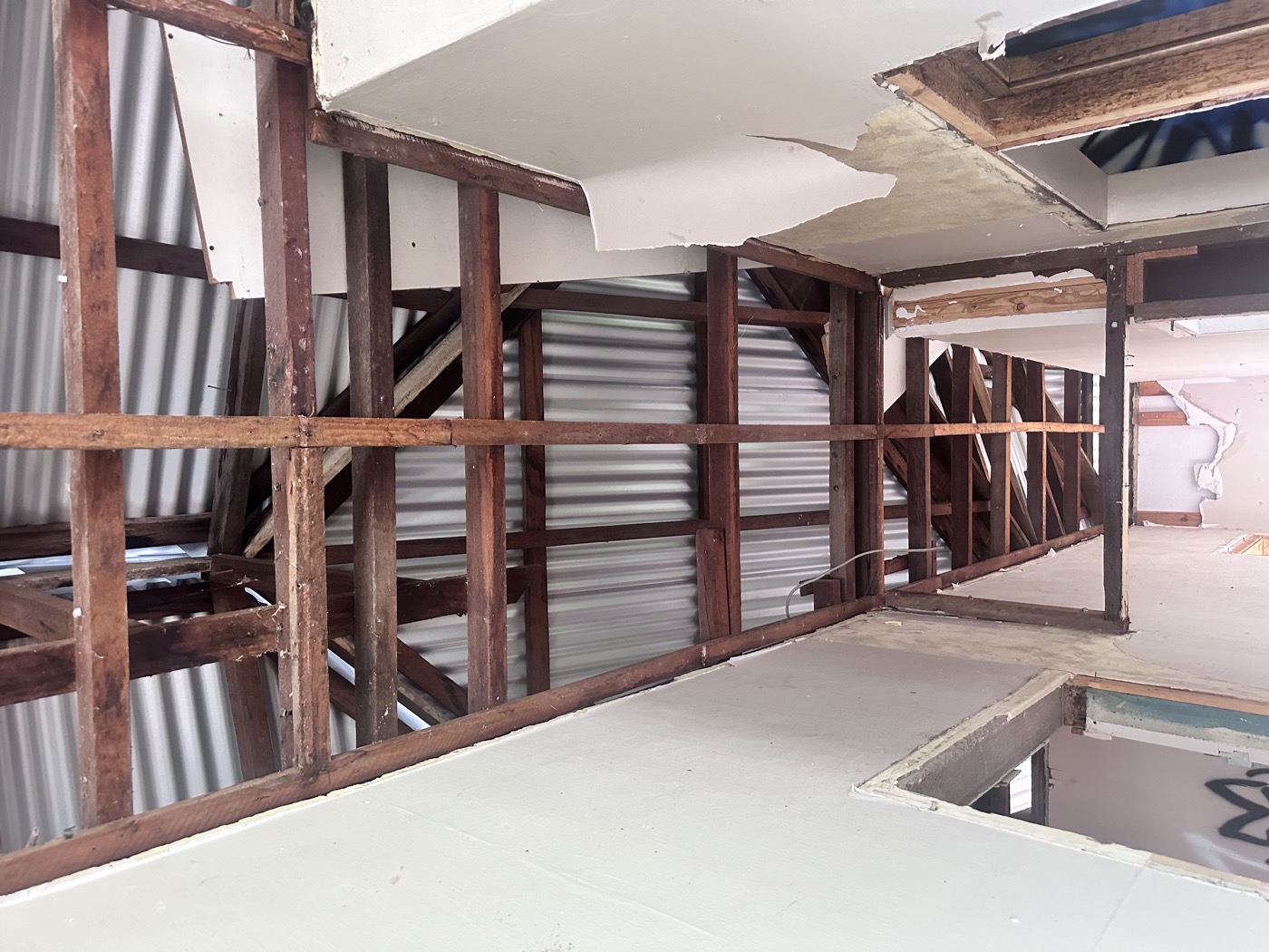 Residential Interior Asbestos Wall Linings Before Safe Removal